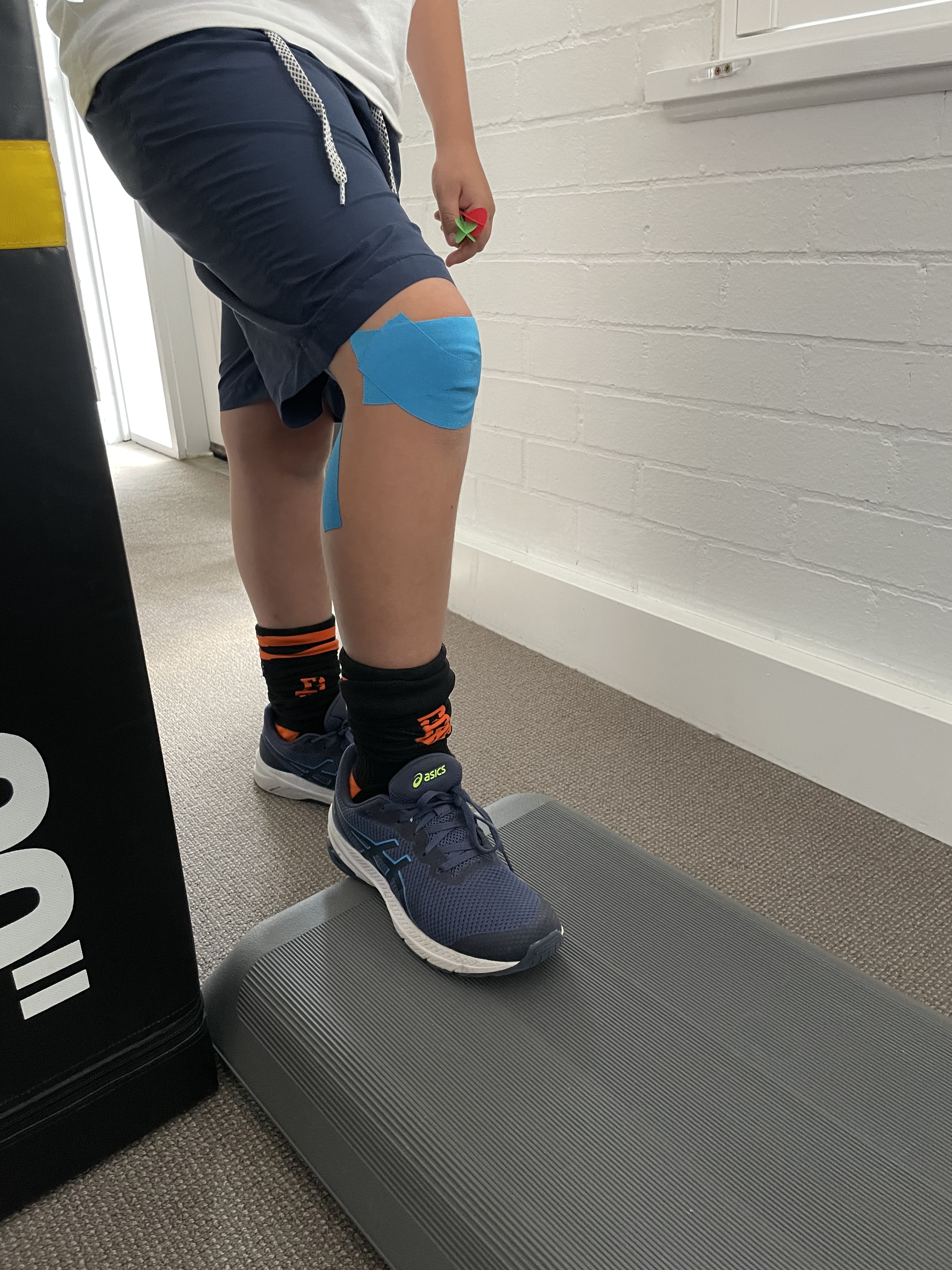 Patient going up a step.